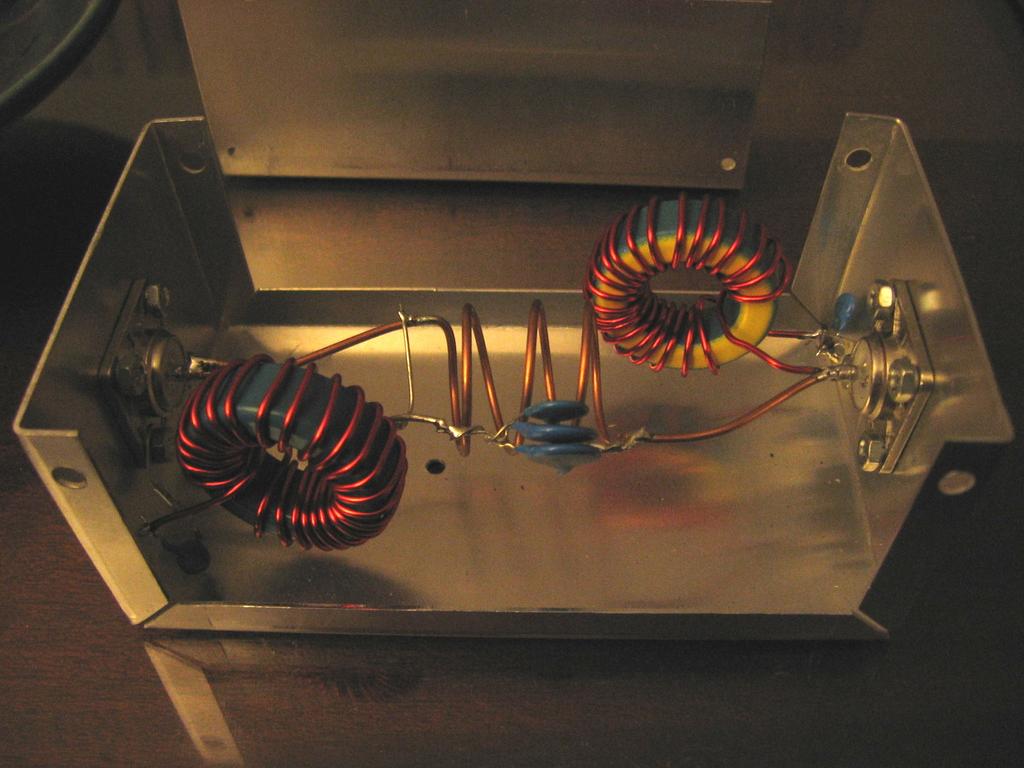 40m current through the L 1 and L 3 inductors is low, so they can be toroidal inductors. I used Micrometals T130-17 cores wound initially with 24 turns of 16 gauge enameled copper wire.