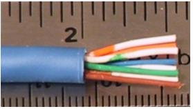 Ethernet Cable Pin-outs above), untwist the pairs of wires and line them up according to the pin-out chart order.