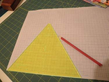 the top. Repeat until all triangles have one sashing strip attached. Cutting and sashing the border triangles Cut 3 strips 8.