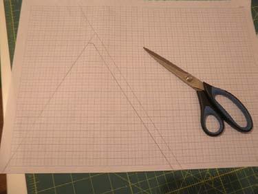 Use this as a template to cut the triangles for the right had side of the quilt. You will not need to add sashing strips to these ones. Assembling the quilt top.