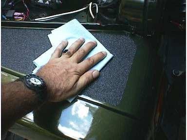 When you are satisfied with the alignment and installation, use a clean dry paper towel or the Protector Backing Paper and thoroughly rub down