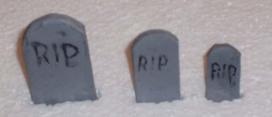 When the tombstone is relatively flat, take black paint and paint the letters.