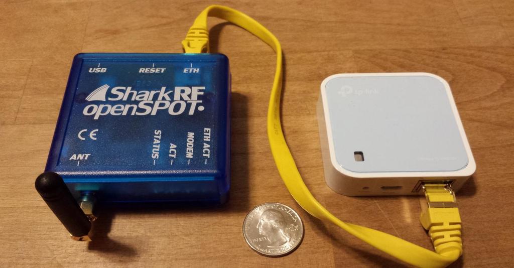 When a SharkRF openspot is connected to an inexpensive portable router (tp-link) and smart