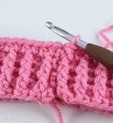 Yarn over and draw through all 3 loops to create your first back post half-double crochet (bphdc).