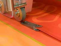 Special guiding devices are available for attaching zipper to material edge.