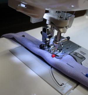 Sew a 3/8 inch seam along the long sides only.