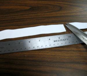 For the hand strap, cut a 10 inch length of 1 inch