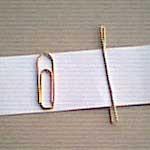 Roll paper around paper clip