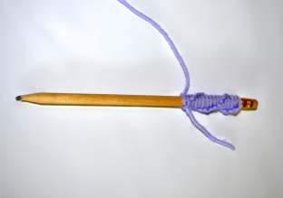 Pencil 4: 4 Now take the yellow yarn and repeat the same knot