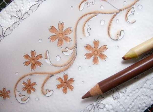 Step 15: Add colour on the back of your parchment design using blendable pencils, blending medium and a paper stub.