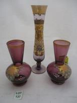 goblet shaped vase and a small glass with
