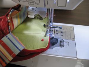 Sew a 1/4 inch seam along the entire top edge of the bag.
