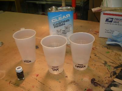 Then mark where the water comes to in each cup and label each cup with which color you plan to use in it as seen in the picture.