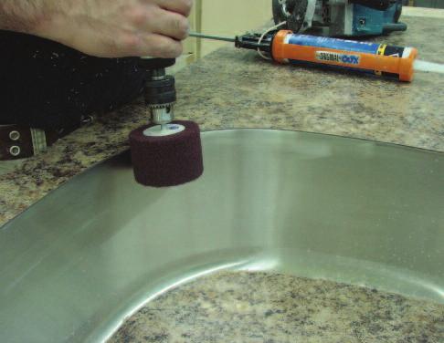 A scuff ball or non-woven flap wheel (available from Domain) works well for