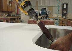 A drum sander with a 150 grit sandpaper also works well to sand the