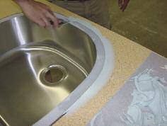 Fill the gap between sink rim and substrate completely.