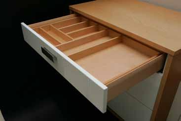 DRAWERS AND RUNNERS Timber Cutlery Tray Accessories Timber Cutlery Tray The Timber Cutlery Trays are constructed from solid beech and are suitable for use across a range of systems.