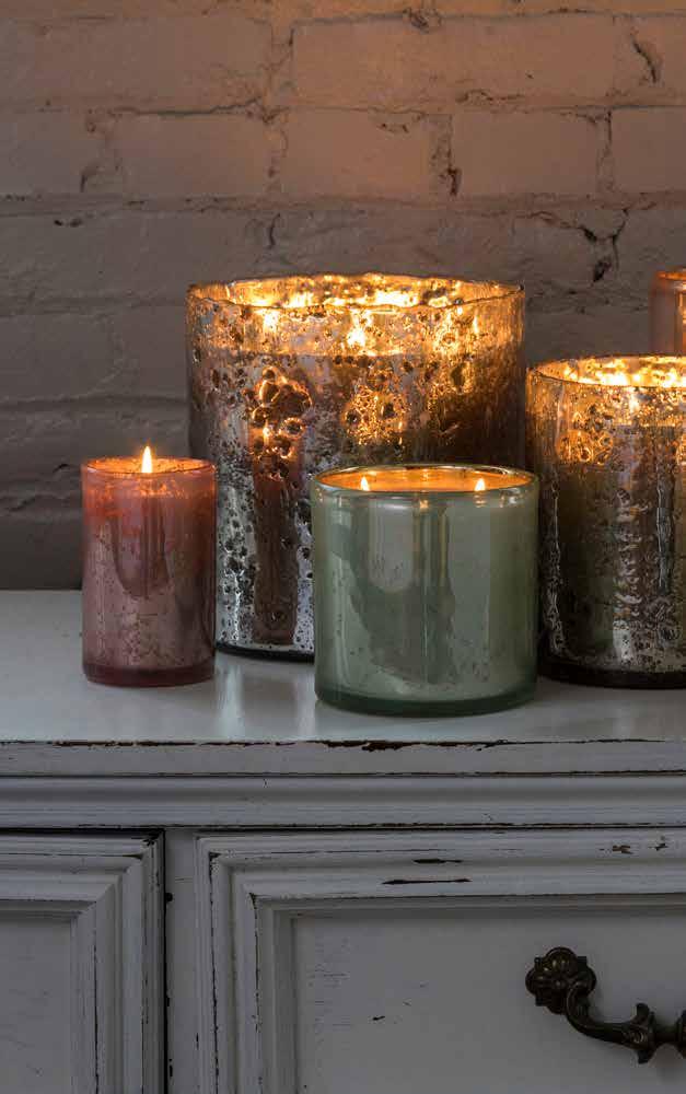 LIVING DECORATIVE FILL COLLECTIONS MOONSTRUCK Mercury glass with a vintage patina creates a soft glow when lit.