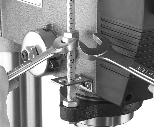 Depth Stop Adjusting Table The Model G797/G798 has a depth stop that allows you to drill repeated non-through holes to the same depth every time.