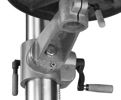 The depth stop consists of a stud attached to the quill with two hex nuts that can be lowered or raised on the stud so the lower nut (depth nut) hits a stop bracket when the drill bit is lowered.