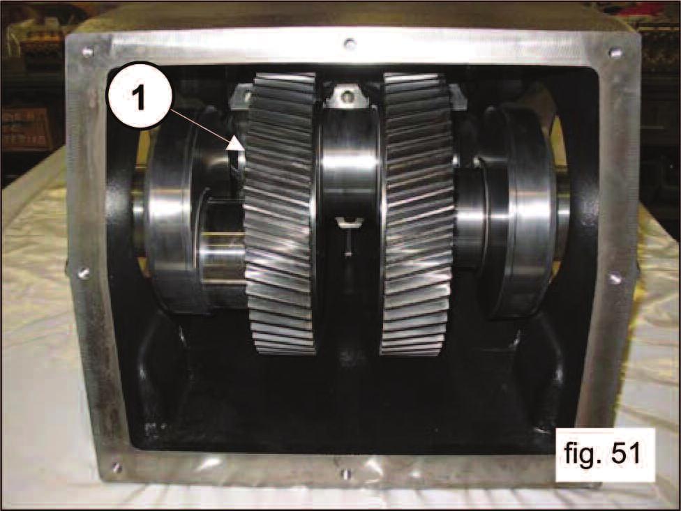 The crankcase must be inserted into the casing so that the teeth on the ring bevel gears are oriented as shown in fig. 51.
