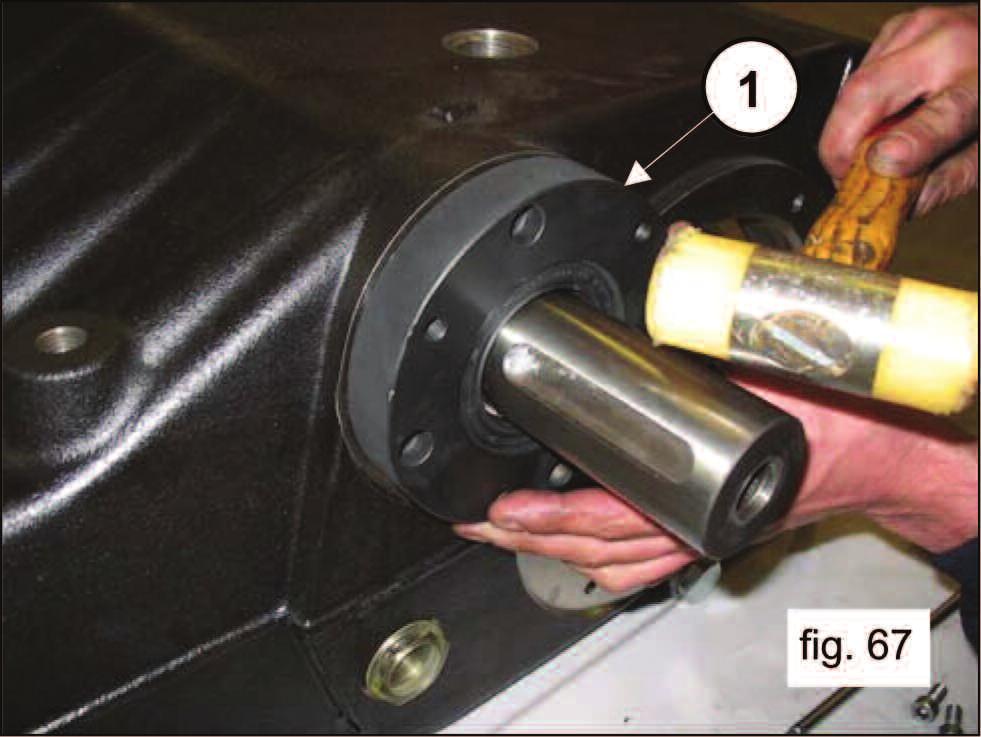 Mount one of the PTO bearing covers (left or right) on the pump casing (pos. 1, fig. 67) and attach it with four M8X30 screws (pos.