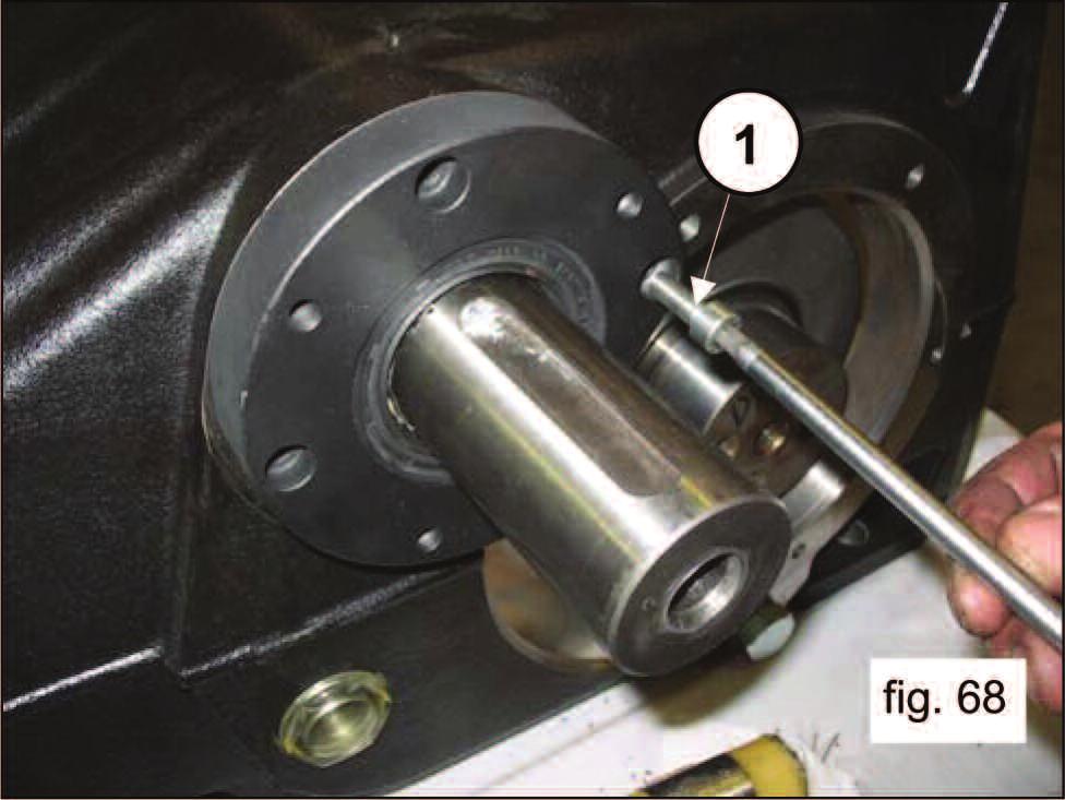 Mount the second PTO bearing on the pump casing (pos. 1, fig. 67) and attach it with 4 M8X30 screws (pos. 1, fig. 68).
