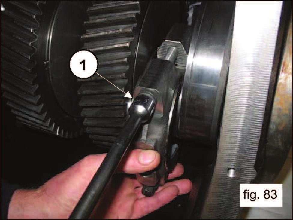 Tighten the screws with a torque wrench, as shown in Section 3, Screw Tightening Settings, bringing the screws