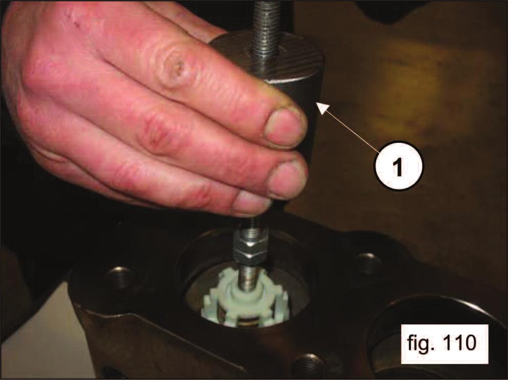 110). If it is particularly difficult to remove the outlet valve assembly (e.g.