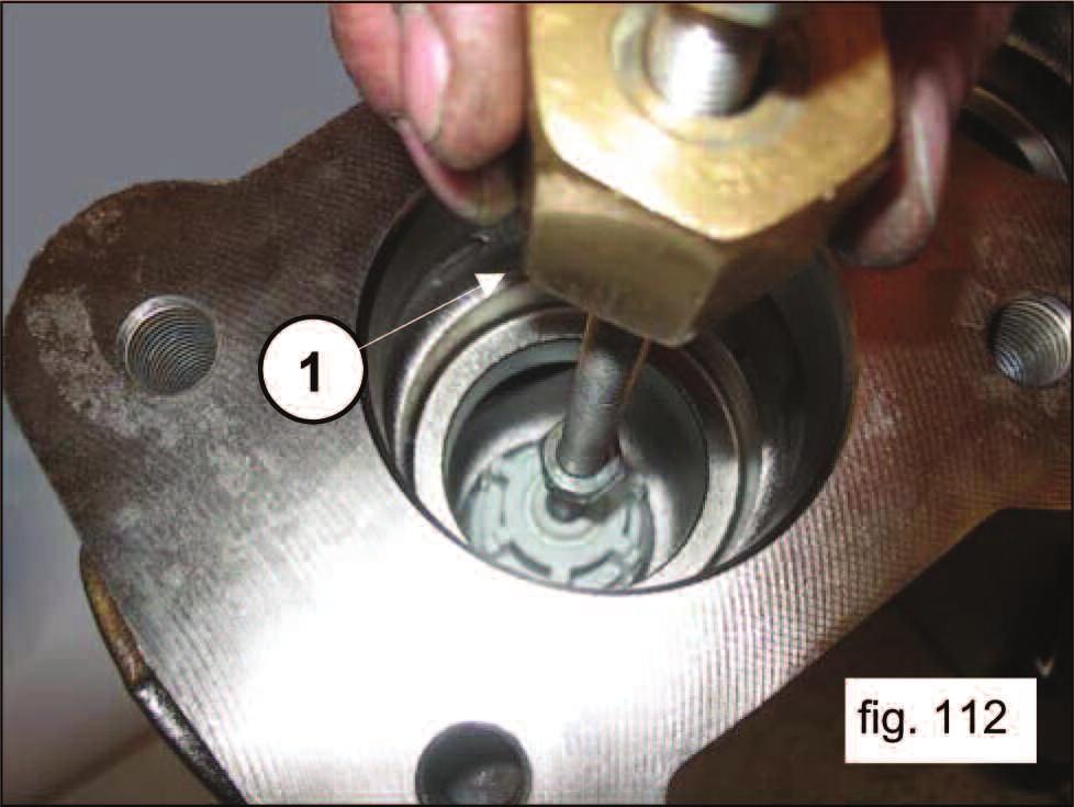 Remove the inlet valve assembly by using a slide hammer puller applied to the M10 hole in the valve