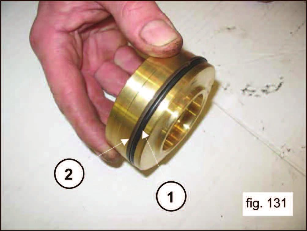 Mount the O-ring, exploded position #17 (pos. 1, fig. 131) and the anti-extrusion ring, exploded position #21 (pos.
