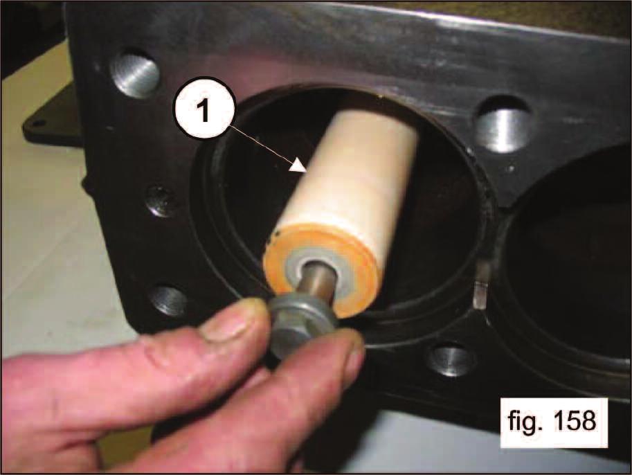 Place the 14x2 O-ring on its seat on the plunger attachment screw