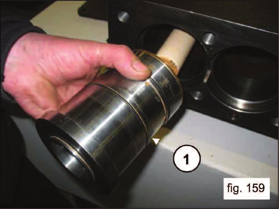 Tighten the screws with a torque wrench, as shown in