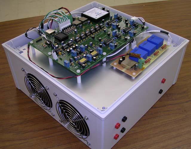 The input filter, power stage, and output filter were all mounted inside the enclosure, along with fans.