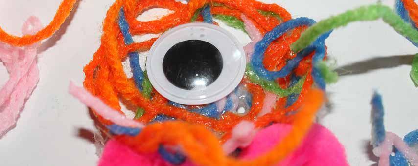Yarn Monsters yarn glue water muffin tin bowl scissors googly eyes Cut various lengths of yarn and stir into a mixture