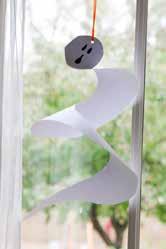 Spiral Ghost white cardstock marker pencil hole punch string or yarn Draw a large spiral on a piece of white cardstock, keeping the lines of the spiral a