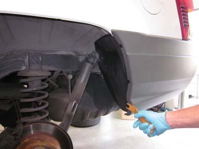 3 4 Fender Lip Using a pry tool or utility knife, remove plastic retainers from the rear bumper piece and