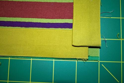 When the flanges overlap at the corner they ll leave a little ½ box of free fabric. 3.