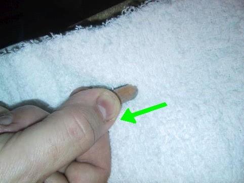 Place a towel on your lap and draw the blade backwards across the towel. This will push the burr forward along the edge.