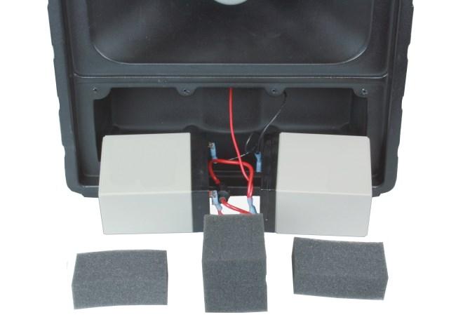 You will now notice foam blocks that hold the two batteries in place preventing them from bouncing around in the compartment (Fig. 2). Remove the foam blocks and set aside.