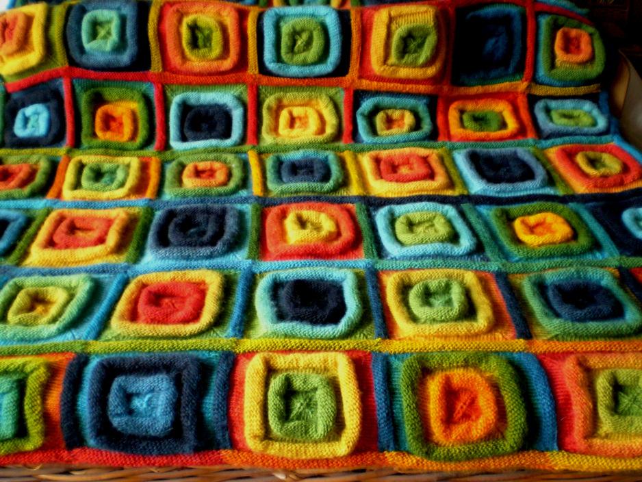 This is seriously tactile knitting and the finished squares are great fun to play with, they pull into mountain-like shapes and the resulting fabric is thick and warm.