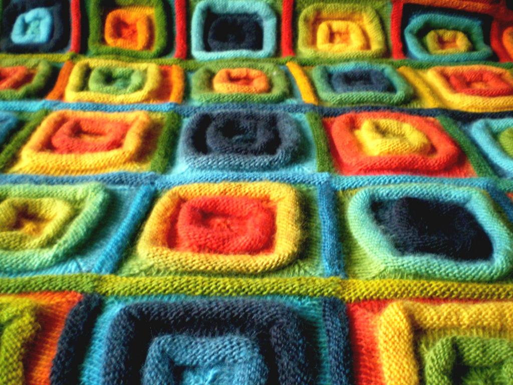 Joining the long strips of squares into a blanket caused me some difficulty.