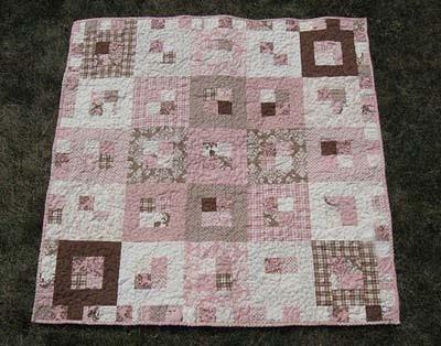 One adorable quilt measuring 42 x 42 (Baby not Included). Happy Quilting!