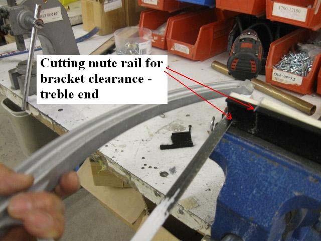 bracket clearance. There is too much material to break off with pliers. (See Ill.