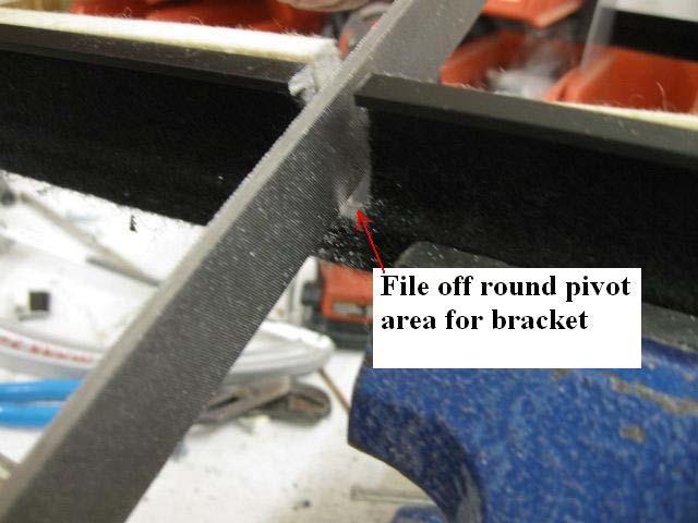 Use a file to smooth the cut areas and round off the area for a pivot point.