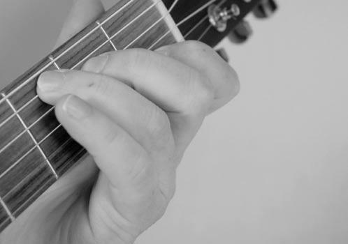 Finger Placement: When you place your fingers on the fretboard, make sure that they are on