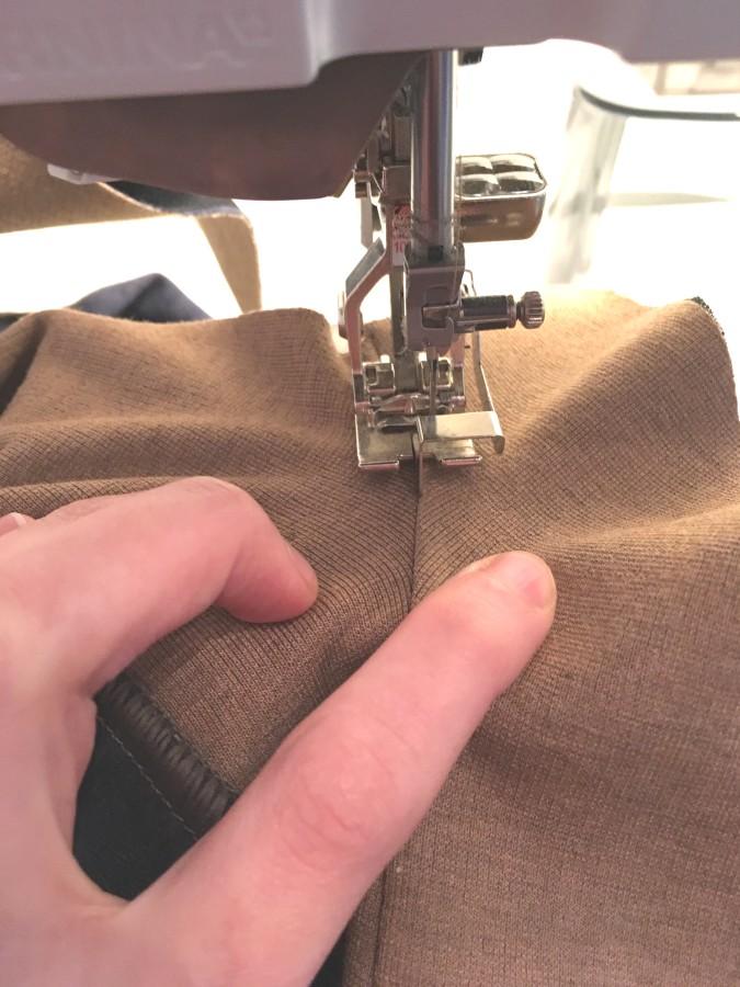 seam allowance to the facing around the armholes only.