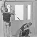 Once the diagonal measurements are the same, apply shims between the door frame and rough opening to keep the door unit in position.