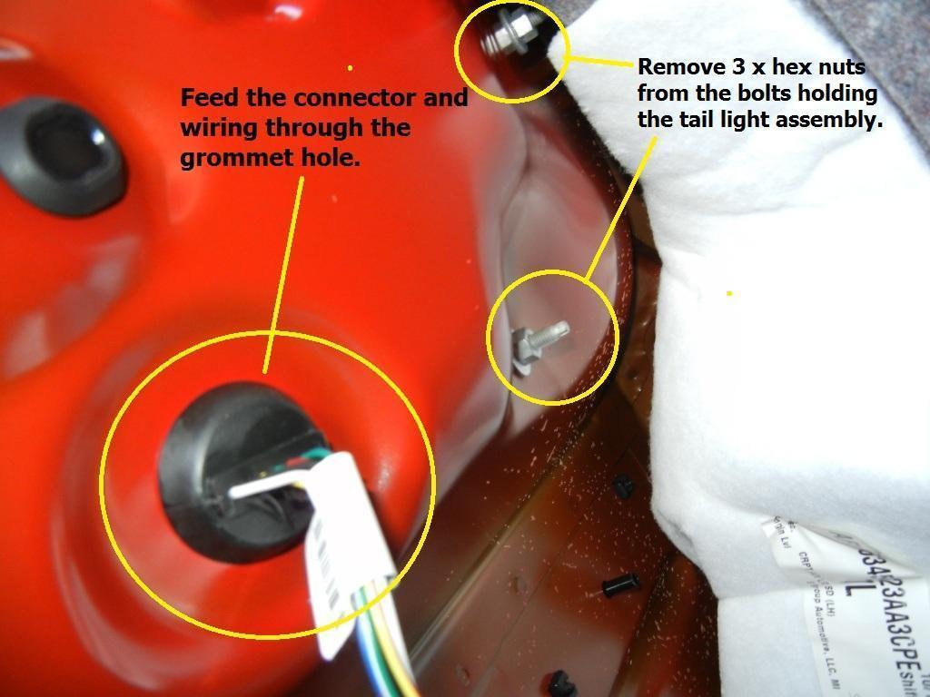 Once you removed all the three hex nuts, push the rubber connector through the grommet hole and feed