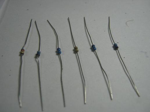 (RED-BLK-BLK-BLK-BRN-BRN) R4 = 200 ohm resistor marked (RED-BRN-BRN) or (RED-BLK-BLK-BLK-BRN) The Pocket PAL resistors are tiny 1/8 watt parts and many of them are close tolerance so they are marked
